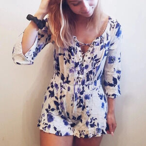 B. Original Blue Floral Lace Up Romper size small